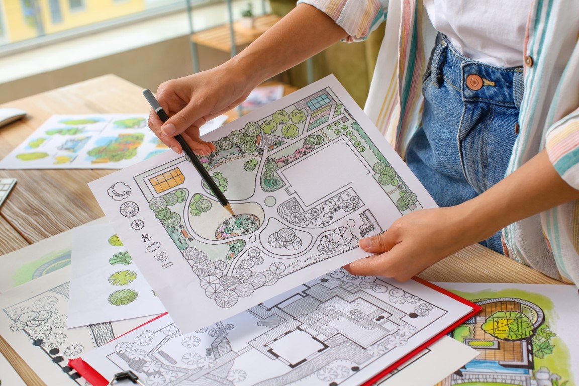 Young,Female,Landscape,Designer,Working,In,Office